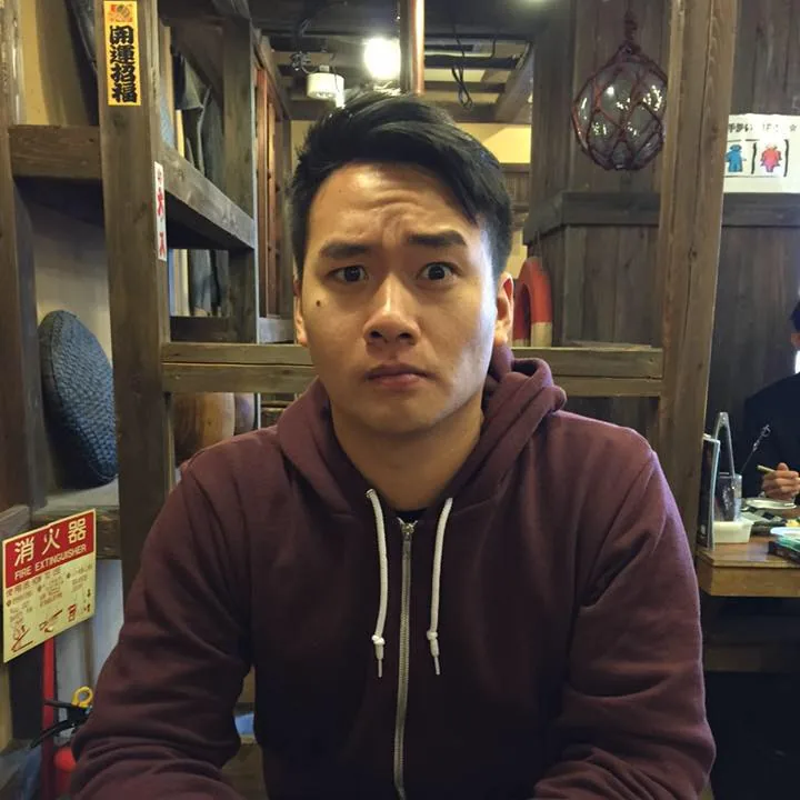 david sasda sitting at table in restaurant