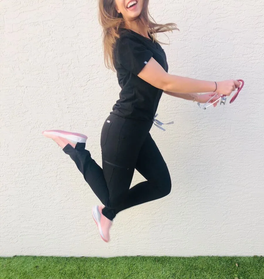 Casey, BSN, RN wearing Clove nursing shoes in "Pink Up"