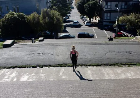 nurse erin kilyroy runs up alta plaza park steps in san francisco