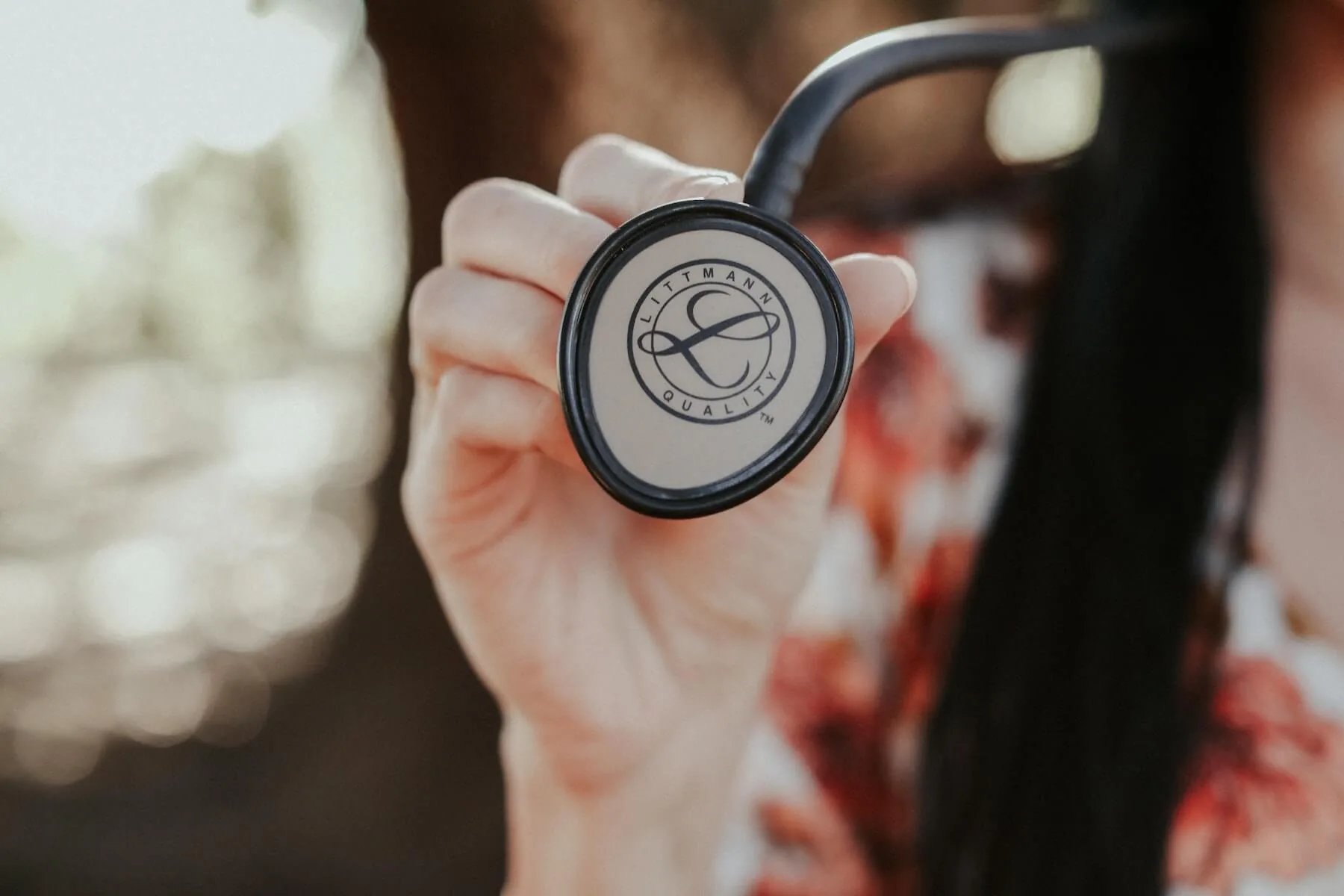 woman holding stethoscope littmann future of nursing education