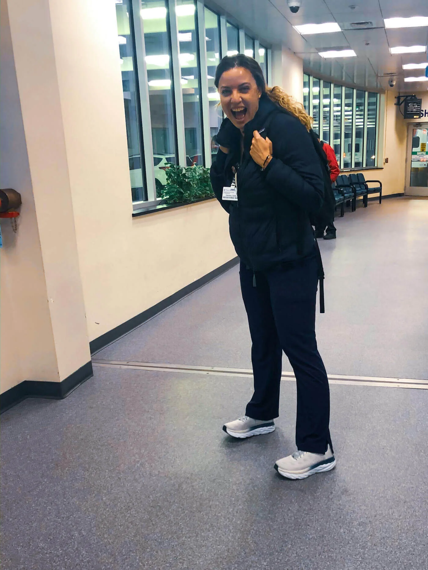 nurse courtney jones wearing hoka shoes in hospital garage hoka nursing shoes