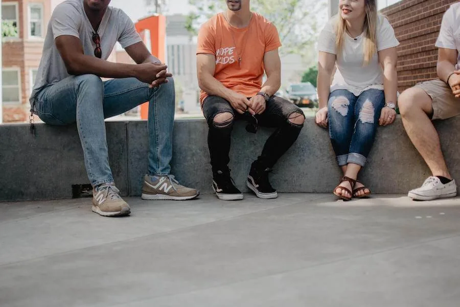 Group of people sitting outside talking
