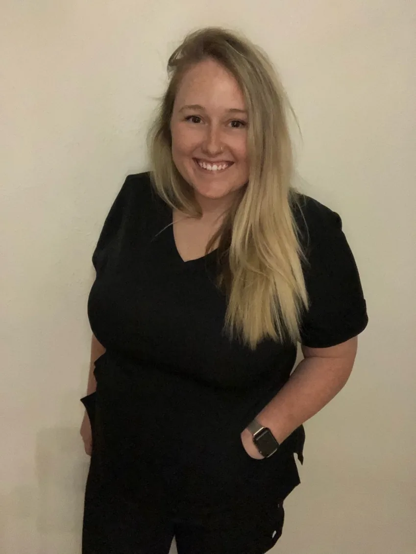Nurse in scrubs indoors